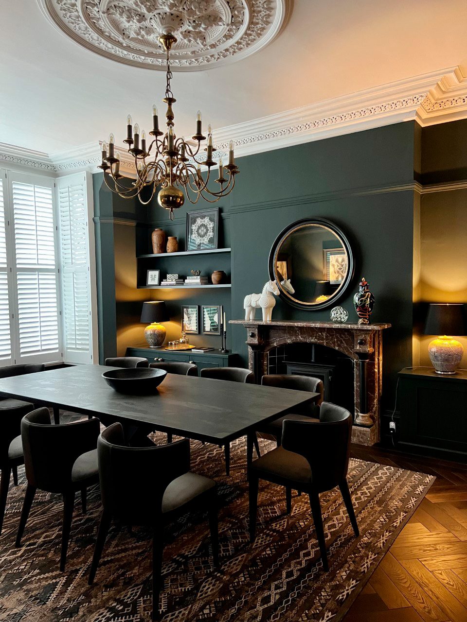 Dekton dining table beside a fireplace