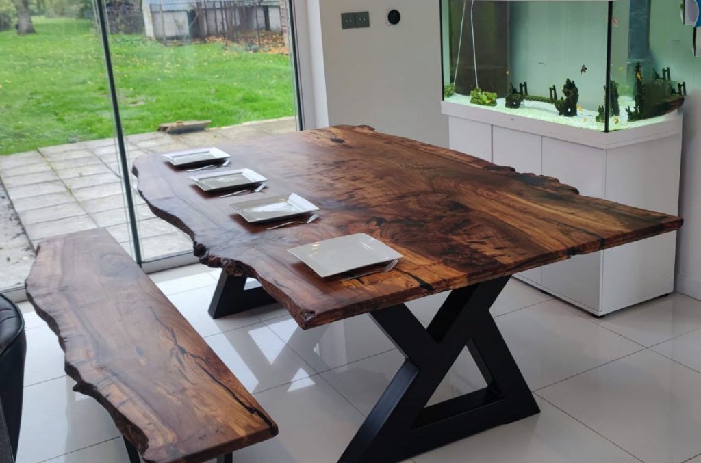 Dining table laid with plates
